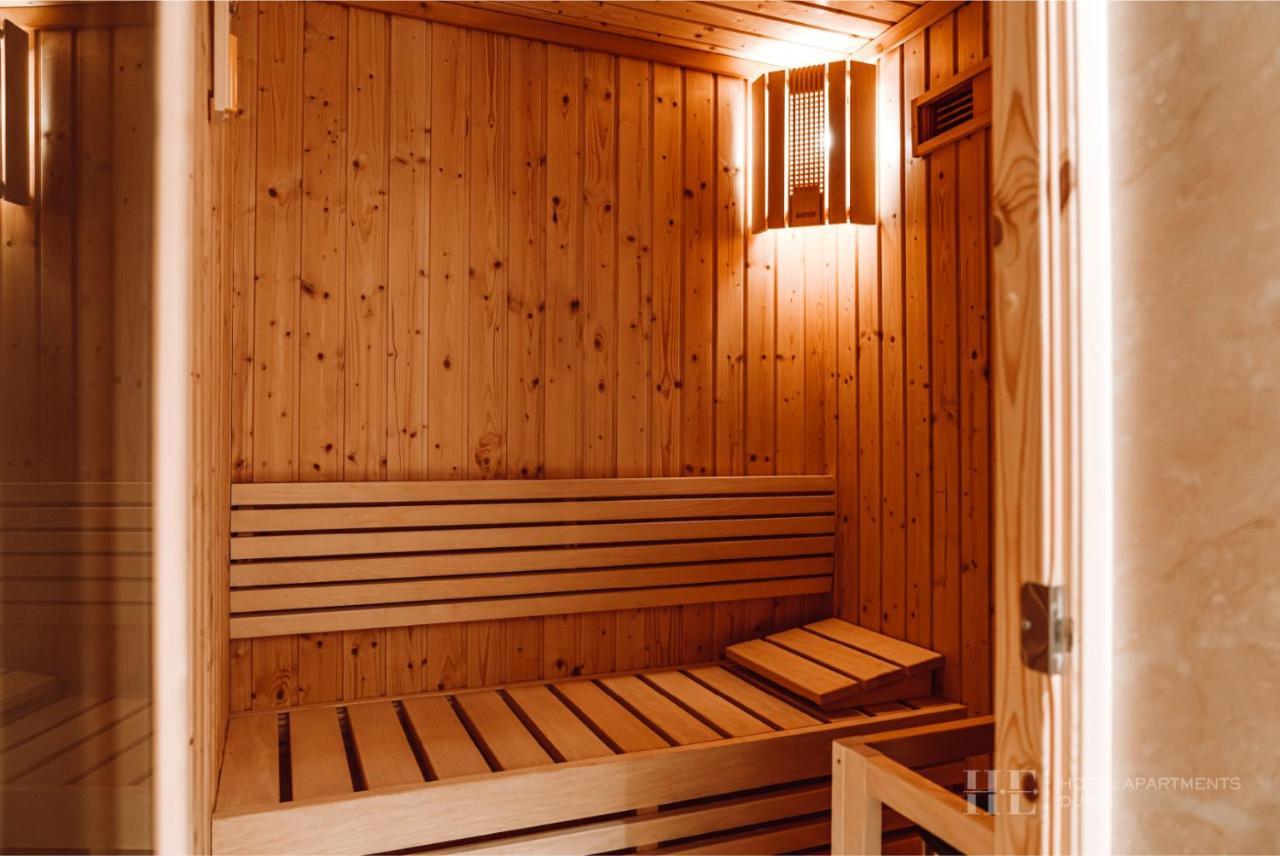 He Hotel Apartments Dubai Dış mekan fotoğraf A Finnish sauna
